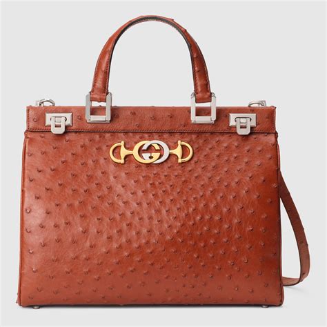 gucci ostrich top handle bag.